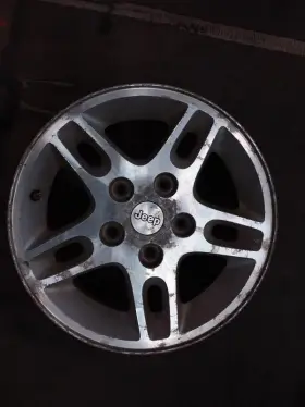 560-09028 Jeep Wheel 16x7 Aluminum 5 Large Triangular Holes Fits 99-00 Grand Cherokee 762235