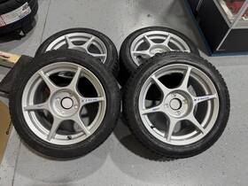 Kosei W29076500c5 4 Pcs K1 Silver 15x7 4x100 38 With 195/50/15 Tires Mounted And Balanced