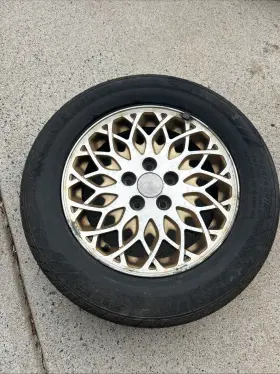 23888 Oem 1998 Chrysler Town Country Gold Rim W Cooper Lifeliner Tire 225/60/16