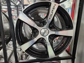 3190-6773m Touren Set Of 4 Tr9. 16x7 5x127 42mm. Gloss Black/macined
