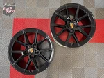 Pair Of Oem Original 21" Porsche 992.2 911 Carrera Wheels Rims Black Remanufactured. Price: $1599.95.