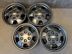 (4) Chevrolet Suburban Tahoe Avalanche Black Wheels Rims + Caps 16" HOL.5096 Used. Price: $895.00.