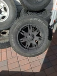 And Tire Package 17" X9 Ultra Gauntlet 238B Black 5X5 12 238-7973B 4 Rims New. Price: $850.00.