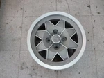New Momo 6" X 13" Cast Unpainted Wheel With Bmw Center Cap. Price: $70.00.