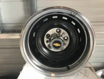 Chevrolet Silverado Black Steel Wheel W/ Trim Ring & Centercap Hollander # 1095 New. Price: $200.00.
