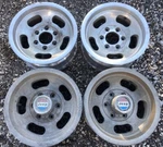 Amc Fsj Jeep 15X7 Wheels J10 Wagoneer Aluminum Slot Rims Center Caps 6 Lug Used. Price: $1000.00.