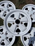 1970 Date Matched 901 Early Porsche Fuchs 14X15.5 With Three Prong Caps Used. Price: $2200.00.