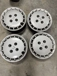 14" Honda Factory Oem Black Steel Wheel 14X5 With Hubcaps Used. Price: $199.00.