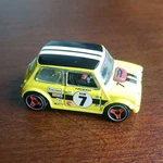 Hot Wheels Morris Mini 1:64 Yellow Black Red Diecast Car 2014 Used. Price: $16.00.