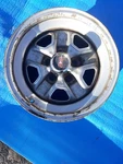Oldsmobile Cutlass Rally Wheel 15X7 W/center Cap And Trim Ring Used. Price: $195.00.