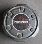 87 88 89 90 92 93 Mazda B-2600 Oem Center Hub Cap S23237191 64691 Used. Price: $39.80.