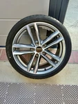 Genuine Bmw Disk Wheel Light Alloy 704M Part # 36-11-7-856-711 With Tire Used. Price: $450.00.