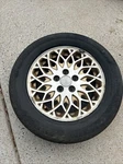 Oem 1998 Chrysler Town Country Gold Rim Cooper Lifeliner Tire 225/60/16 Used. Price: $75.00.